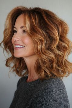 Click for More ➡️ | Save for Later ❤️  Natural curls are enhanced with a textured cut, while warm toffee highlights add dimension. This is a great option for curly-haired women who want to add shape and flair. (Textured Curls with Toffee Highlights - Medium-Length Hairstyles For Women Over 40) Balayage On Layered Hair, Toffee Highlights, Lob With Curtain Bangs, Medium Length Hair Women, Textured Curls, Medium Length Hairstyle, Older Women's Hairstyles, Haircuts For Medium Length Hair, Wavy Lob