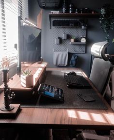 a computer desk with a keyboard and mouse on it