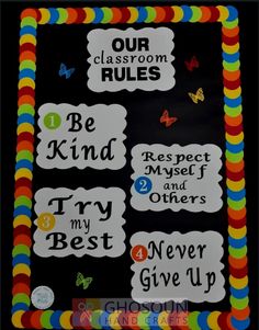 a classroom bulletin board with colorful writing and pictures on the front, along with words that spell out our classroom rules