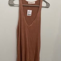 Urban Outfitters Muscle Shirt Really Soft Spring Brown Tank Top For Day Out, Brown Tank Top For Summer Loungewear, Urban Outfitters Spring Tank Top, Urban Outfitters Brown Sleeveless Top, Urban Outfitters Top For Summer Loungewear, Urban Outfitters Summer Loungewear Tops, Sleeveless Brown Top From Urban Outfitters, Urban Outfitters Sleeveless Summer Tops, Urban Outfitters Summer V-neck Tank Top