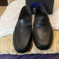 Buttery Leather Leather Loafers Never Worn, New In Box Size 10.5 3e Black Almond Toe Moccasins For Formal Occasions, Formal Black Almond Toe Moccasins, Black Moc Toe Moccasins For Formal Occasions, Formal Black Moccasins With Moc Toe, Designer Business Moccasins With Moc Toe, Black Tassel Loafers With Moc Toe And Leather Lining, Black Moc Toe Loafers For Formal Occasions, Formal Black Moc Toe Moccasins, Black Plain Toe Moccasins For Semi-formal Occasions