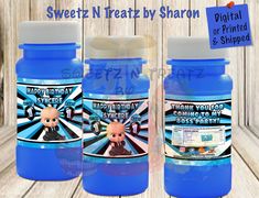 two blue bottles with an image of a cartoon character on the front and back one is labeled sweet n treatz by sharon