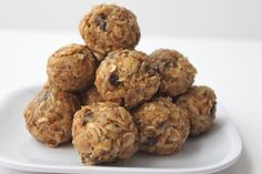 healthy snack no bake energy bites on a white plate with information about the recipe