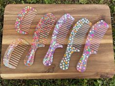 These GORGEOUS custom combs are HANDMADE! Each piece is laid by hand. These make the perfect gift for bridesmaids, little girls, party favors, easter baskets, the possibilities are endless!  If you are looking for a unique gift, this is the one for you. When checking out please don't forget to include the name you would like on your comb, if no name is provided there will be no personalization added.  BEAD COLORS ARE RANDOM! I will do my best to never have a repeated letter color. Depending on l Brush And Comb Set, Brush And Comb, Girls Party Favors, Comb Set, Brush Hair, Etsy Stuff, Unique Presents, Girls Party, Gifts Unique