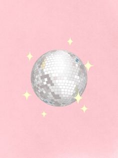 a shiny disco ball with stars on a pink background