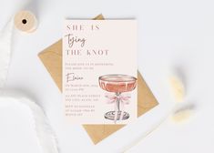 a card with a pink cocktail on it