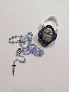 Rosary of Our Lady of Good Health in half blue crystal, rosary length cm 40 (15.74 inches) equipped with hook to wear it. Handcrafted in Italy, complete with deluxe metal case with image of the Madonna della Buona Salute on the lid. Handmade by expert craftsmen in the sector with top-notch materials and quality. For an excellent success of the delivery we ask you to leave a telephone number to be delivered to the courier. The online sale of sacred statues, icons, silverware, religious items and Our Lady Of Good Health, The Madonna, Caravaggio, Good Health, Our Lady, Blue Crystals, Rosary, Madonna, Pandora Charm Bracelet