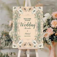 an easel with a sign that says welcome to our wedding