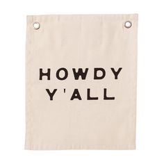 a white bag with the words howdy y'all printed on it in black