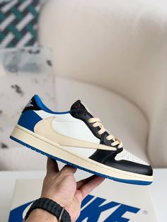 Capture the essence of hype and high fashion with these sneakers inspired by the coveted Travis Scott x Fragment x Air Jordan 1 Low. This design flawlessly blends iconic elements from both collaborators, featuring a classic colorway of white, blue, and sail, accented by the signature reverse Swoosh. Crafted with premium materials and meticulous attention to detail, these sneakers offer a look that's both timeless and trendsetting. Step into the spotlight and elevate your sneaker game with this m Fall Winter Jacket, Loafer Sneakers, Bottega Veneta Shoulder Bag, Sneaker Games, Air Jordan 1 Low, Jordan 1 Low, Travis Scott, Air Jordan 1, Brunei