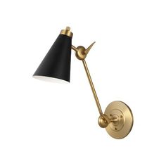 a black and gold wall light with a white shade on the side, against a white background