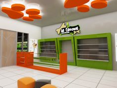 the interior of a restaurant with orange and green accents