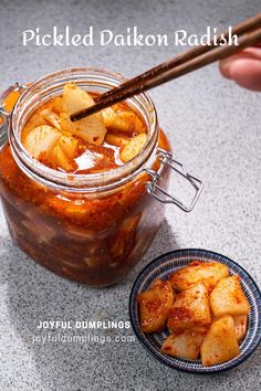 pickled daikon radish in a jar with a spoon