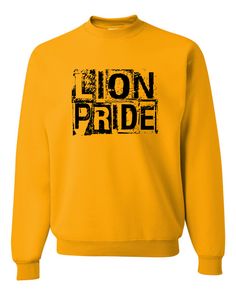 Lion Pride Type Crew shown on Gold Gildan Crew Neck. *** Please indicate your sport in the customization field*** You love how comfortable our t-shirts are. Our shirts are professionally made by our little family right here in the USA! Product Details: 8 oz./yd² (US) 13.3 oz./L yd (CA), 50/50 cotton/polyester, 20 singles Heather Sport colors are 60/40 polyester/cotton Safety Green is compliant with ANSI / ISEA 107 high-visibility standards Classic fit 1x1 rib with spandex for enhanced stretch an Crew Neck Sublimation T-shirt For Sports Events, Sublimation Crew Neck Design For Sports Events, Sports Sublimation Text Print Crew Neck, Sporty Crew Neck With Sublimation Text Print, Black Sweatshirt With Letter Print For Team Events, Casual Sublimation T-shirt With Letter Print For Team Events, Cotton Team Events Sweatshirt With Letter Print, Cotton Letter Print Sweatshirt For Team Events, School Spirit Crew Neck T-shirt With Team Name