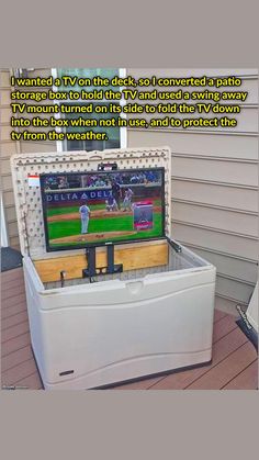 an ice chest with a baseball game on the tv screen in it's back