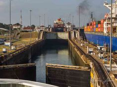 a large cargo ship passing through a lock