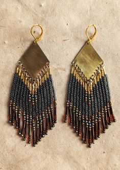 Handmade beaded fringe earrings created with pyrite stones, glass seed beads, brass, and high-quality Japanese thread for durability. Stone: Faceted Pyrite Beads: Miyuki, Toho, and Czech Ear Wire: 18k gold-plated Drop Height: 4 in. Thread: Nylon Nickel Free Made to order, ships within 2-3 weeks Born into slavery, she was a fierce proponent of the abolitionist movement and an early activist for civil and women’s rights. Her famous “Ain’t I a Woman?” speech at the Ohio Women’s Rights Convention in Gold Artisan Beaded Earrings With Dangling Beads, Artisan Gold Earrings With Beaded Fringe, Gold Artisan Beaded Fringe Earrings, Beaded Brass Earrings For Festival, Handwoven Brass Beaded Dangle Earrings, Beaded Dangle Earrings In Brass, Festival Brass Beaded Earrings With Gold Beads, Handwoven Gold Beaded Brass Earrings, Gold Beaded Brass Earrings For Festivals