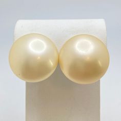 Gorgeous vintage earrings in very good condition !! They are marked Sterling and have the patent number on the backs. The dome itself is plastic and a lovely cream color. view more earrings here: https://www.etsy.com/shop/PalomaAndBianca?ref=seller-platform-mcnav&section_id=28740715&page=1#items learn more about jewelry at PalomaAndBianca.com Our jewelry is vintage and/or preowned. Therefore, there may be some patina or imperfections expected with age. Please ask any questions you have before pu Formal Cream Pearl Earrings, Dome Earrings, Vintage Rhinestone Earrings, Cloisonne Earrings, Rhinestone Bow, Inner Light, Enamel Flower, Red Rhinestone, Screw Back Earrings