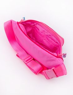 Our Fanny Sling is the cross body bag you've been waiting for! This silhouette hugs your body in all the right places and is the perfect medium size that will hold your necessities without weighing you down. Features super soft match nylon webbing, tonal piping details, match buckle, a padded exterior for extra comfort and insulation, 3 separate zipper compartments, and two additional pockets in the main compartment. Coordinating paracord pulls make opening this bag a cinch! Comes with a matchin Sporty Nylon Chest Bag With Functional Pockets, School Nylon Belt Bag With Zipper Pocket, Nylon Shoulder Bag With Functional Pockets For School, Nylon Crossbody Belt Bag For School, Sports Chest Bag With Adjustable Strap In Nylon, Functional Bags With Removable Padding, Sporty Nylon Chest Bag, Nylon Belt Bag With Adjustable Strap For School, Functional Belt Bag With Adjustable Strap For School