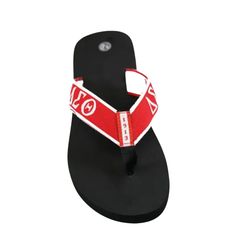 a pair of red and white sandals with the word on it