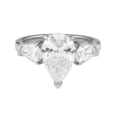 Graff 18K Platinum RingComes with original Box and Appraisal From GraffCentral Pear Cut Diamond: 2.42ctw (GIA certified) 2 Pear Cut Diamonds on the sides: 1.04ctw (GIA certified) Size: 6 SKU: ECJ02617 Luxury Pear-shaped Platinum Diamond Ring, Luxury Gia Certified Pear-shaped Rings, Luxury Pear-shaped Gia Certified Rings, Gia Certified Teardrop White Ring, Elegant Gia Certified Teardrop Diamond Ring, Formal Gia Certified Teardrop Diamond Ring, Gia Certified Teardrop Diamond Ring For Formal Occasions, Elegant Pear-shaped Gia Certified Ring, Elegant Gia Certified Pear-shaped Ring