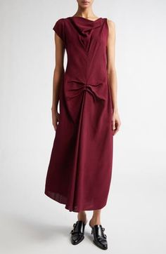 A fall '24 runway highlight, this asymmetric midi dress reimagines a signature house style with an elegant drape at the neckline and pleat detailing at the waist for effortless sophistication. 50" length (size 2) Hidden back zip; keyhole with hook-and-eye closure Asymmetric neck Single cap sleeve Unlined 100% viscose Dry clean Made in Portugal Designer Clothing Fall 24, Elegant Drapes, Victoria Dress, Free Fabric, Fashion Help, Dress Romper, Nordstrom Dresses, Victoria Beckham, Sweater Skirt