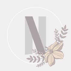 the letter n is surrounded by flowers and leaves on a light gray background with a white circle around it