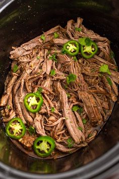 the meat and peppers are cooked in the slow cooker