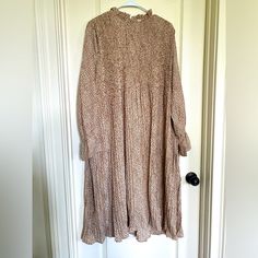 Size Is Xl But Runs Big More Like Xxl. High Neck, Lines, Long Sleeve. Too Large And Couldn’t Return. I Am 5’2” And It Was Too Long For Me. Love The Dress Had It Fit! Feminine Beige Long Sleeve Midi Dress, Modest Beige Long Sleeve Dress, Feminine Long Sleeve Beige Midi Dress, Oversized Pleated Spring Dress, Casual Beige Pleated Maxi Dress, Fall Beige Pleated Midi Dress, Beige Ruffled Maxi Dress For Fall, Casual Pleated Beige Maxi Dress, Cream Ruffled Maxi Dress For Fall