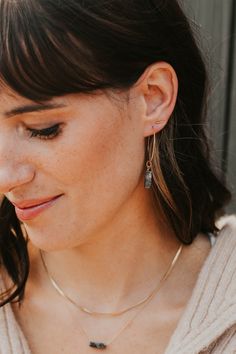 These simple studs are officially raising the BAR. Pair with your other favorite earring—we love combining these with anything from our MINI Collection, or wear these as the main act. A favorite, versatile, everyday stud. Bar measures 1mm x 10mm or 1mm x 6mm. Sold as a pair. Shown on Abbie with our Tiny Twist Earrings. Available in 14kt Gold Fill + Sterling Silver. Our jewelry is handmade so each piece will be unique and may vary slightly from what is pictured. Simple Studs, Twist Earrings, Copper Uses, Everyday Wear Jewelry, Mini Collection, Bar Studs, Black Sapphire, Jewelry Cleaner, Jewelry Case