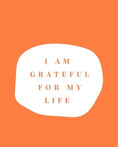 an orange and white speech bubble with the words i am grateful for my life