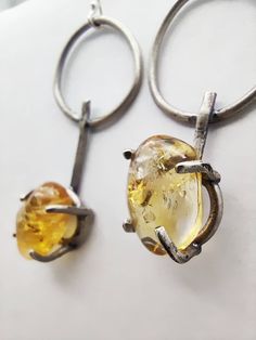 Textured and unique handmade sterling silver earrings with gorgeous citrine stone. Silver Citrine Drop Earrings, Silver Citrine Drop Earrings Jewelry, Handmade Silver Citrine Earrings, Silver Citrine Gemstone Earrings, Modern Amber Jewelry With Citrine, Hand Forged Amber Sterling Silver Jewelry, Modern Amber Citrine Jewelry, Unique Handmade Topaz Jewelry, Handmade Round Citrine Earrings