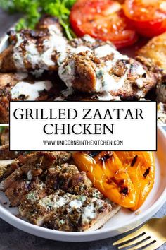 grilled zaata chicken on a plate with tomatoes and peppers