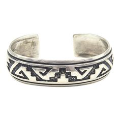 This is part of Chairish’s Costume Jewelry assortment.  Navajo Silversmith Rosita Singer's overlay  sterling silver cuff bracelet featuring a traditional Navajo pattern  The back is marked Singer Sterling.  Interior of the cuff measures 5 1/2" with an additional 1 " gap for a total circumference of 6 1/2".  Sterling Silver is relatively malleable, thus this cuff is slightly adjustable. Width measures 2.53" straight across the widest part (from wrist bone to wrist bone). Bracelet face measures .61" tall (the face of the bracelet, north to south). Bracelet depth from top the underside of wrist is 2". Traditional Adjustable Cuff Bracelet With Inlay, Traditional Adjustable Inlay Cuff Bracelet, Bohemian Silver Cuff Bracelet With Inlay, Silver Bohemian Cuff Bracelet With Inlay, Chunky Silver Jewellery, Bone Bracelet, Navajo Pattern, Sterling Silver Cuff Bracelet, Pottery Designs