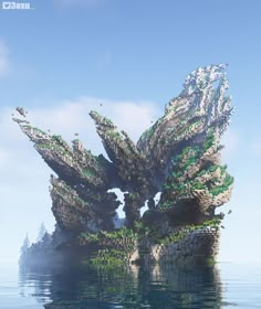 an image of a very large plant in the middle of the ocean with water around it