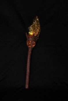 a wooden stick with some lights on it