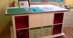 a desk with drawers and a laptop on it in a child's playroom