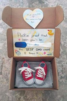 a pair of red and white shoes in a cardboard box with the message positive proof that soon you'll be