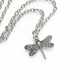 Dragonfly Necklace Silver Dragonfly Jewelry Dragonfly Lover Gift for Women-I make this necklace using an antique silver dragonfly charm and chain-Pick any chain length from the dropdown menu, if you don't see the length you want, select "custom" and leave it in the 'note to seller' at checkout-Pendant measures 1" tall x 7/8" wide-Nickel free lead free alloy metal-GIFT BOXEDMore of my Dragonfly Jewelry Here:https://www.etsy.com/shop/lydiasvintage/items?search_query=dragonflyMore of my Necklaces:h Bohemian Silver Dragonfly Necklace, Pretty Jewelry Necklaces, Dragonfly Jewelry, Dragonfly Charm, Dragonfly Necklace, Dragonfly Pendant, Mismatched Earrings, Pretty Jewellery, Necklace Silver