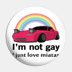 a pink car with the words i'm not gay, just love matas