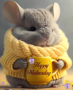 a mouse holding a coffee mug with the words happy wednesday written on it and wearing a sweater