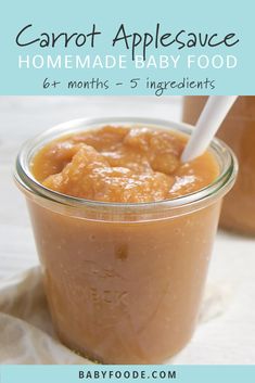 two jars filled with peanut butter on top of a white tablecloth next to each other