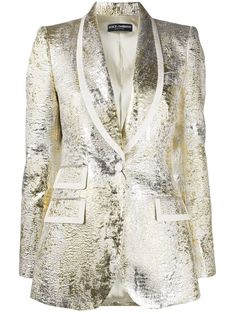 Sleek, chic and your wardrobe's peak - this textured metallic silk wool blazer jacket from Dolce & Gabbana won't go unnoticed. Shine through the crowd and never look back. What are you waiting for? Featuring a shawl lapel, a front button fastening, front flap pockets, long sleeves and button cuffs. | Dolce & Gabbana Metallic Textured Blazer Designer Silk Outerwear For Party, Designer Silk Party Outerwear, Designer Silk Winter Blazer, Designer Silk Blazer For Winter, Chic Tailored Gold Blazer, Luxury Notch Lapel Blazer For Night Out, Chic Gold Blazer With Notch Lapel, Designer Tailored Blazer For Party, Designer Silk Blazer For Fall