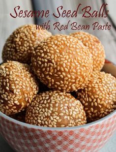 sesame seed balls with red bean paste in a bowl