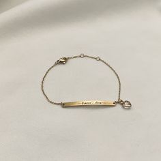 This is a personalized bracelet with birthstone. You can engrave 2 names connected with heart on bracelet.   - Bar size : 40mm x 3mm  - Bithstone : 6mm  - Bracelet length : 6.0" ~ 7.0"   It will be the best gift to show your love for your family and friends. This will be packed and delivered with cute small box. How to order: 1. choose the birthstone from menu 2. Enter 2 names on personalization  If you have any questions, please feel free to contact me. Thank you. Rose Gold Stainless Steel Promise Jewelry, Adjustable Engraved Stainless Steel Jewelry, Engraved Adjustable Stainless Steel Jewelry, Minimalist Metal Bracelets For Mother's Day, Elegant Personalized Heart Metal Bracelet, Rose Gold Name Jewelry For Promise, Rose Gold Jewelry For Promise, Personalized Metal Bracelets For Mother's Day, Personalized Adjustable Metal Chain Bracelet