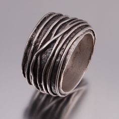 Handcrafted fine silver ring wrapped with fine silver threads all around. Each ring & every size is custom made and there are no two exact matching rings. the threads are wrapped differently from one ring to the other. Personalized engraving is possible for an additional charge. please click on the listing below: https://www.etsy.com/transaction/1032057720 great gift for men, unisex ring. Artisan Silver Hand Wrapped Rings, Great Gifts For Men, Matching Rings, Unisex Ring, Wrap Rings, One Ring, Gift For Men, Fine Silver, Jewelry Inspiration