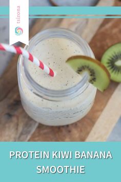 a smoothie in a mason jar with kiwi slices and straws on the side