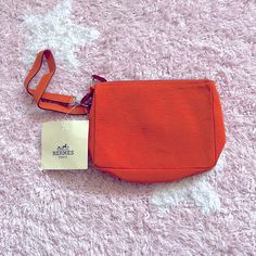 Can Go On Any Bag Super Practical And Cute Rectangular Orange Pouch For Daily Use, Orange Rectangular Pouch With Removable Section, Orange Rectangular Pouch For Daily Use, Hermes Bag With Engraved Zipper Pull For Everyday Use, Orange Travel Pouch With Zipper, Cheap Orange Shoulder Bag For On-the-go, Orange Pouch Bag For On-the-go, Hermes Orange Bag, Cloth Tote Bag