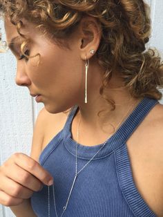 "These beautiful bar earrings are simple yet very noticeable, the hammering process leaves tiny facets on the bars that catch light and sparkle as you wear it. Great for dressing up or to wear casually with jeans. 925 Sterling silver Handmade silver earrings hooks silver bar measures 2\" long Link back to my shop https://www.etsy.com/shop/TayTayInspired" Minimalist Long Drop Hammered Jewelry, Minimalist Everyday Linear Earrings With Hammered Detail, Everyday Minimalist Hammered Linear Earrings, Single Long Drop Threader Earring For Everyday, Single Everyday Long Drop Threader Earring, Everyday Long Drop Threader Earring, Minimalist Hammered Dangle Linear Earrings, Nickel-free Long Drop Threader Earrings, Minimalist Hammered Long Drop Earrings