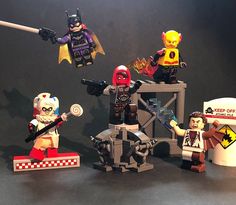 the lego batman movie minifigurs are posed together